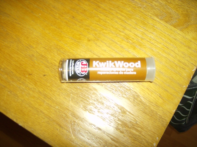 KwikWood magical putty. Kneed a blob of it, smoosh it into the gauge. It. Smells. Awful. But it works great.